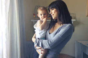 woman holding baby